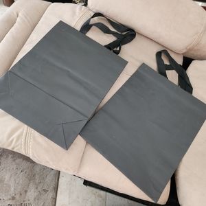 2 XL paper shopping bags
